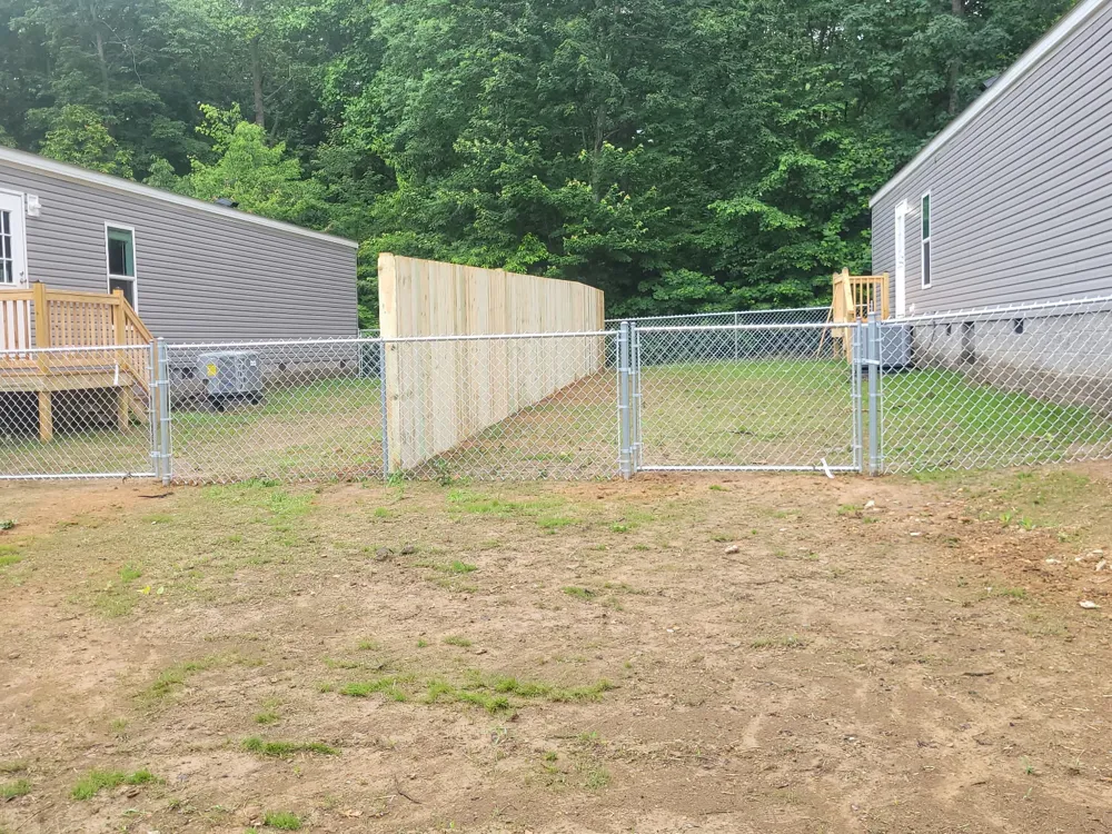 Chain link fence run installed by RB Fence between two homes